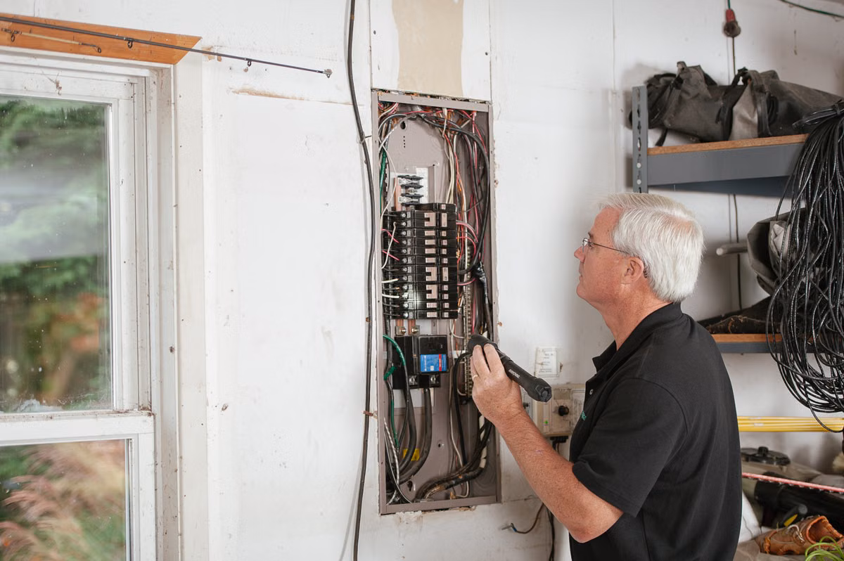Appliance Matters technician performing preventive maintenance on household appliances in a Calgary home