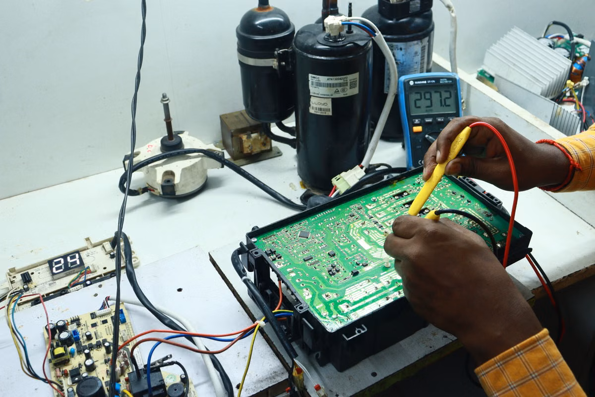 Appliance Matters Ltd technician inspecting a kitchen appliance in Calgary, AB